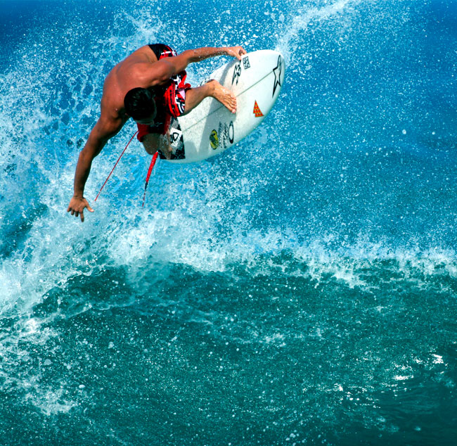 Fotomurales de surfista en la ola vinilos